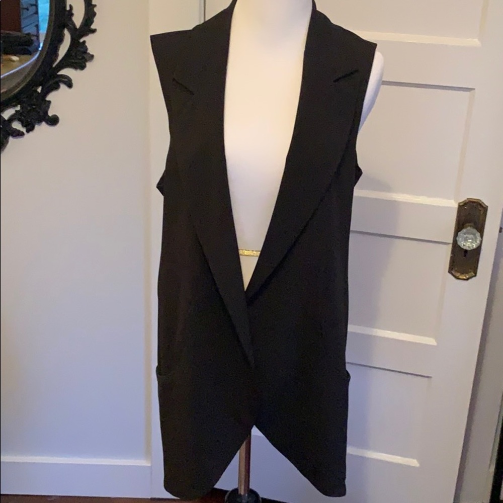 Long fitting suited vest